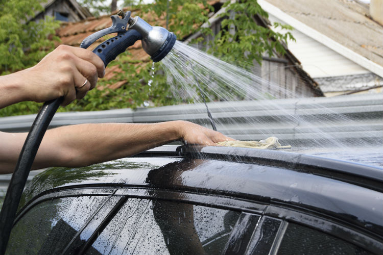 Rinse the car with garden hose